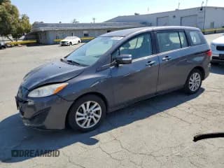 ✅ 2013 Mazda 5 Sport • VIN: JM1CW2BL6D0147010 • Lot: 64989675. Listed on Copart with 170,361 mi. Free auction sales archive from the USA and detailed vehicle history report at DreamBid. Image 1.