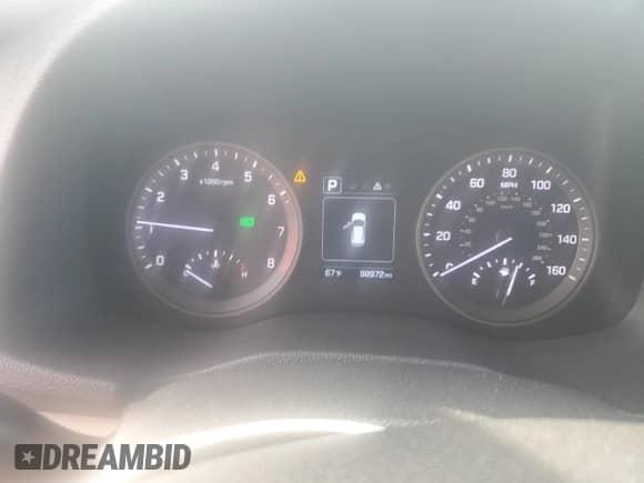 2016 Hyundai Tucson Limited z VIN KM8J33A27GU127386, wystawiony jako Copart lot #89872365 z przebiegiem 98 972 mil mil oraz Szkoda całkowita • Salvage title. Historia ofert i sprzedaży dostępna na DreamBid. Obrazek 9.