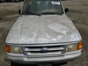 ✅ 1996 Ford Ranger XLT • VIN: 1FTCR10X1TUC90736 • Lot: 56605575. Listed on Copart with 94,262 mi. Free auction sales archive from the USA and detailed vehicle history report at DreamBid. Image 12.