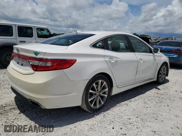 ✅ 2015 Hyundai Azera • VIN: KMHFG4JGXFA468082 • Lot: 69019715. Listed on Copart with 127,984 mi. Free auction sales archive from the USA and detailed vehicle history report at DreamBid. Image 3.