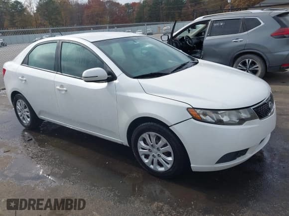✅ 2012 Kia Forte EX • VIN: KNAFU4A22C5586985 • Lot: 43765645. Listed on IAAI with 131,065 mi. Free auction sales archive from the USA and detailed vehicle history report at DreamBid. Image 1.