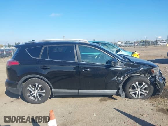 ✅ 2016 Toyota RAV4 LE • VIN: 2T3ZFREV9GW245352 • Lot: 43555598. Listed on IAAI with 55,660 mi. Free auction sales archive from the USA and detailed vehicle history report at DreamBid. Image 13.