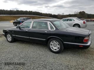 ✅ 2003 Jaguar XJ Vanden Plas • VIN: SAJDA24CX3LF55964 • Лот: 79812444. Опубликован ранее на Copart с пробегом 173 281 миль. Бесплатный доступ к архиву аукционных продаж из США и подробный отчёт об истории автомобиля на DreamBid. Изображение 2.