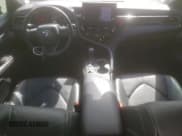 ✅ 2023 Toyota Camry TRD • VIN: 4T1KZ1AKXPU071810 • Lot: 87010795. Listed on Copart with 33,708 mi. Free auction sales archive from the USA and detailed vehicle history report at DreamBid. Image 8.