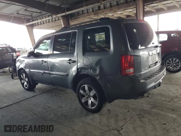 ✅ 2013 Honda Pilot Touring • VIN: 5FNYF4H97DB046413 • Lot: 92087595. Wystawiony na Copart z przebiegiem 130 927 mil. Bezpłatny archiwum sprzedaży aukcyjnych z USA i szczegółowy raport historii pojazdu na DreamBid. Zdjęcie 2.
