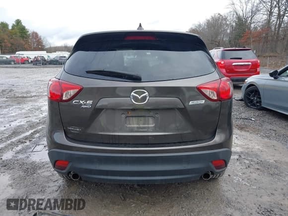 ✅ 2016 Mazda CX-5 Grand Touring • VIN: JM3KE4DY6G0738999 • Лот: 43670069. Опубликован ранее на IAAI с пробегом 168 251 миль. Бесплатный доступ к архиву аукционных продаж из США и подробный отчёт об истории автомобиля на DreamBid. Изображение 16.