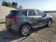 ✅ 2016 Mazda CX-5 Sport • VIN: JM3KE2BY8G0751261 • Лот: 84947675. Опубликован ранее на Copart с пробегом 124 496 миль. Бесплатный доступ к архиву аукционных продаж из США и подробный отчёт об истории автомобиля на DreamBid. Изображение 3.