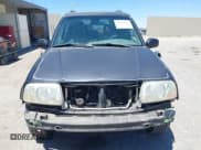 ✅ 2002 Suzuki XL7 Standard • VIN: JS3TX92V124122384 • Лот: 42709086. Опубликован ранее на IAAI с пробегом 196 311 миль. Бесплатный доступ к архиву аукционных продаж из США и подробный отчёт об истории автомобиля на DreamBid. Изображение 13.