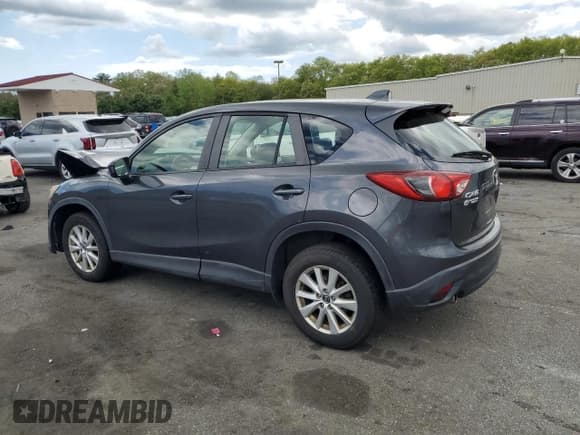 ✅ 2014 Mazda CX-5 Sport • VIN: JM3KE2BE5E0311095 • Lot: 56219775. Listed on Copart with 131,060 mi. Free auction sales archive from the USA and detailed vehicle history report at DreamBid. Image 2.