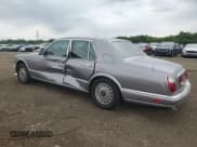 ✅ 2000 Rolls-Royce Silver Seraph • VIN: SCALA61E5YCX04056 • Лот: 65081655. Опубликован ранее на Copart с пробегом 96 794 миль. Бесплатный доступ к архиву аукционных продаж из США и подробный отчёт об истории автомобиля на DreamBid. Изображение 2.