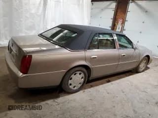 ✅ 2000 Cadillac DeVille DHS • VIN: 1G6KE57Y2YU193102 • Lot: 55532594. Listed on Copart with 132,197 mi. Free auction sales archive from the USA and detailed vehicle history report at DreamBid. Image 3.