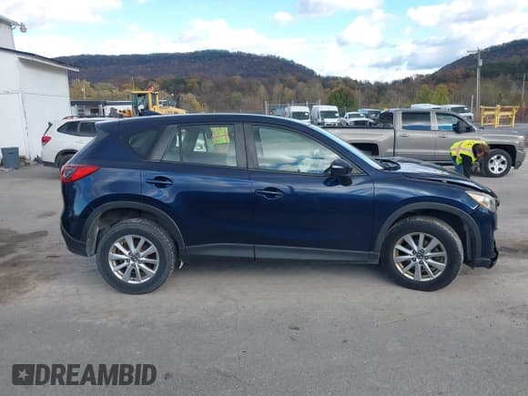 ✅ 2016 Mazda CX-5 Sport • VIN: JM3KE4BY1G0751369 • Lot: 43579410. Listed on IAAI with 163,000 mi. Free auction sales archive from the USA and detailed vehicle history report at DreamBid. Image 13.