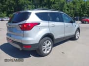 ✅ 2019 Ford Escape SEL • VIN: 1FMCU9H93KUA36717 • Lot: 42592193. Listed on IAAI with 123,099 mi. Free auction sales archive from the USA and detailed vehicle history report at DreamBid. Image 4.