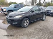 ✅ 2007 Mazda CX-7 Grand Touring • VIN: JM3ER29L870122594 • Lot: 42048506. Listed on IAAI with 119,207 mi. Free auction sales archive from the USA and detailed vehicle history report at DreamBid. Image 2.