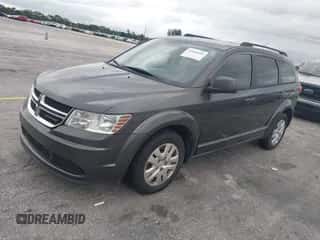 2014 Dodge Journey SE z VIN 3C4PDCAB0ET284048, wystawiony jako IAAI lot #43436446 z przebiegiem 164 883 mil mil oraz . Historia ofert i sprzedaży dostępna na DreamBid. Obrazek 2.