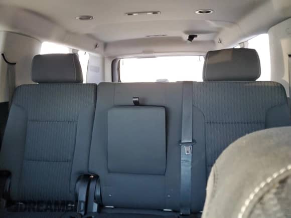 2018 Chevrolet Suburban LS z VIN 1GNSKGKC1JR201493, wystawiony jako Copart lot #87856345 z przebiegiem Nie podano mil oraz Szkoda całkowita • Salvage title. Historia ofert i sprzedaży dostępna na DreamBid. Obrazek 10.