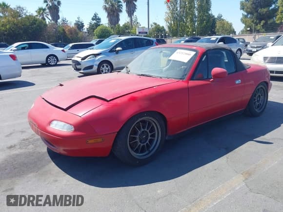 ✅ 1996 Mazda MX-5 Miata • VIN: JM1NA3532T0713199 • Lot: 43212880. Listed on IAAI with 189,580 mi. Free auction sales archive from the USA and detailed vehicle history report at DreamBid. Image 2.