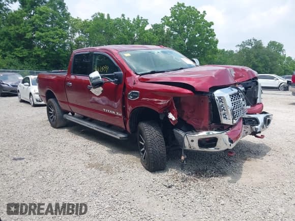 ✅ 2016 Nissan Titan Platinum Reserve • VIN: 1N6BA1F44GN501411 • Lot: 42410999. Wystawiony na IAAI z przebiegiem 149 277 mil. Bezpłatny archiwum sprzedaży aukcyjnych z USA i szczegółowy raport historii pojazdu na DreamBid. Zdjęcie 1.