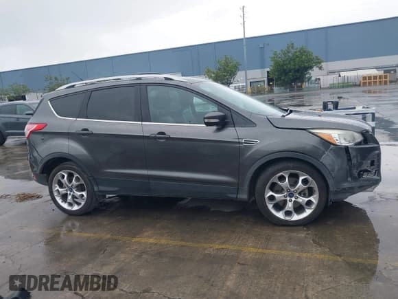 ✅ 2015 Ford Escape Titanium • VIN: 1FMCU0J93FUB49949 • Lot: 43715609. Listed on IAAI with 161,783 mi. Free auction sales archive from the USA and detailed vehicle history report at DreamBid. Image 13.