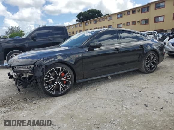 ✅ 2018 Audi A7 Premium Plus • VIN: WAUW3AFC7JN004606 • Lot: 82257755. Listed on Copart with 58,805 mi. Free auction sales archive from the USA and detailed vehicle history report at DreamBid. Image 1.