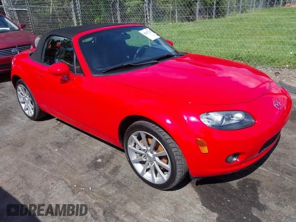 ✅ 2006 Mazda MX-5 Miata Sport • VIN: JM1NC25F560111660 • Lot: 42827191. Listed on IAAI with 71,282 mi. Free auction sales archive from the USA and detailed vehicle history report at DreamBid. Image 1.