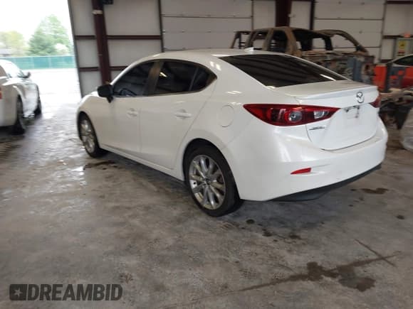 ✅ 2014 Mazda 3 S Touring • VIN: JM1BM1V3XE1209964 • Lot: 42124520. Listed on IAAI with 137,091 mi. Free auction sales archive from the USA and detailed vehicle history report at DreamBid. Image 3.
