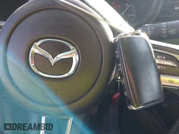 ✅ 2022 Mazda CX-30 S Premium • VIN: 3MVDMBDLXNM418896 • Lot: 43677405. Listed on IAAI with 29,689 mi. Free auction sales archive from the USA and detailed vehicle history report at DreamBid. Image 11.