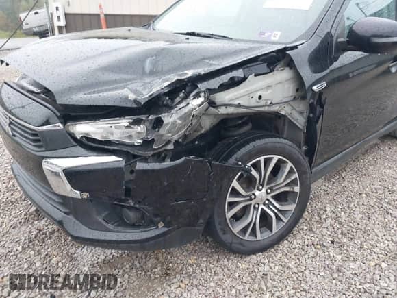 2016 Mitsubishi Outlander ES with VIN JA4AP3AU0GZ033356, listed as a IAAI auction lot 43148018 with 168,338 mi miles and . Bid and sale history available at DreamBid. Image 6.