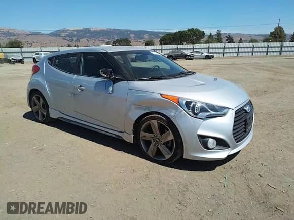 2013 Hyundai Veloster Turbo с VIN KMHTC6AE9DU134548, выставлен на аукционе Copart как лот 71230115 с пробегом 127 248 миль миль и Списание • Salvage title. История ставок и продаж доступна на DreamBid. Изображение 13.
