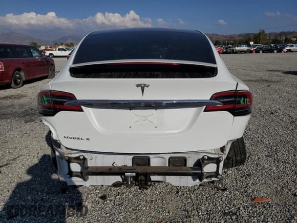 ✅ 2018 Tesla Model X 75D • VIN: 5YJXCBE20JF129810 • Лот: 84007445. Опубликован ранее на Copart с пробегом 64 597 миль. Бесплатный доступ к архиву аукционных продаж из США и подробный отчёт об истории автомобиля на DreamBid. Изображение 6.
