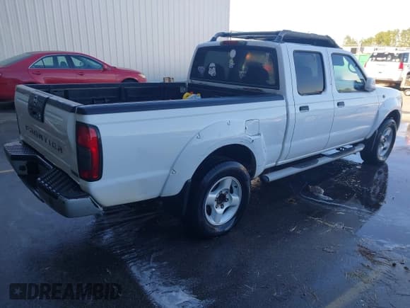 ✅ 2002 Nissan Frontier SE • VIN: 1N6ED29X82C376921 • Lot: 43705446. Listed on IAAI with 221,294 mi. Free auction sales archive from the USA and detailed vehicle history report at DreamBid. Image 4.