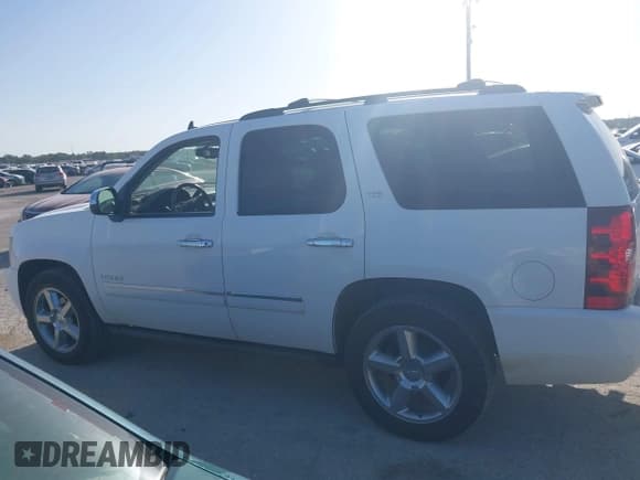 ✅ 2011 Chevrolet Tahoe LTZ • VIN: 1GNSCCE03BR397672 • Lot: 42775981. Listed on IAAI with 210,316 mi. Free auction sales archive from the USA and detailed vehicle history report at DreamBid. Image 14.