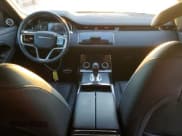 ✅ 2022 Land Rover Range Rover Evoque R-Dynamic S • VIN: SALZT2FX0NH167507 • Lot: 84201644. Wystawiony na Copart z przebiegiem 29 576 mil. Bezpłatny archiwum sprzedaży aukcyjnych z USA i szczegółowy raport historii pojazdu na DreamBid. Zdjęcie 8.