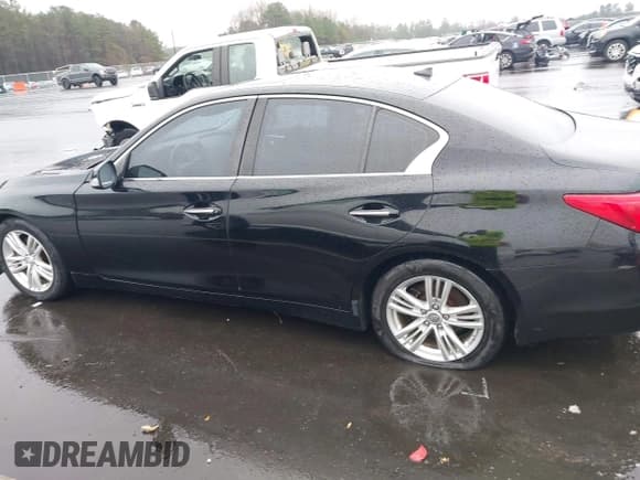 ✅ 2014 Infiniti Q50 Premium • VIN: JN1BV7AP3EM681580 • Lot: 43831567. Listed on IAAI with 223,674 mi. Free auction sales archive from the USA and detailed vehicle history report at DreamBid. Image 15.