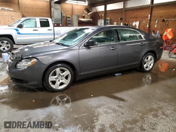 ✅ 2011 Chevrolet Malibu 1FL • VIN: 1G1ZA5E19BF285471 • Lot: 80197094. Listed on Copart with 136,504 mi. Free auction sales archive from the USA and detailed vehicle history report at DreamBid. Image 1.