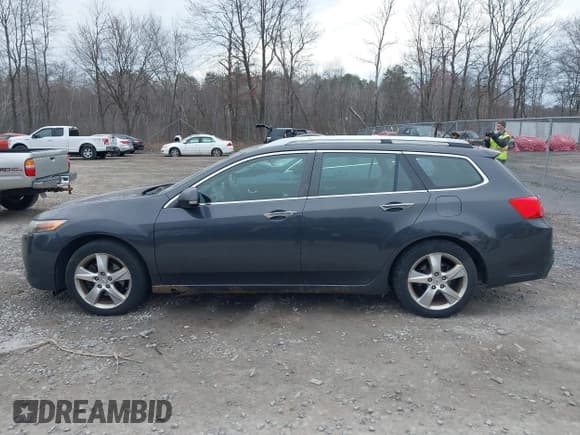 ✅ 2011 Acura TSX • VIN: JH4CW2H59BC001798 • Lot: 42008323. Listed on IAAI with 221,735 mi. Free auction sales archive from the USA and detailed vehicle history report at DreamBid. Image 14.