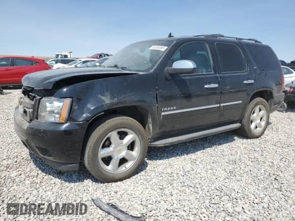 2013 Chevrolet Tahoe LTZ z VIN 1GNSKCE01DR257321, wystawiony jako Copart lot #65388095 z przebiegiem 131 835 mil mil oraz Szkoda całkowita • Salvage title. Historia ofert i sprzedaży dostępna na DreamBid. Obrazek 1.