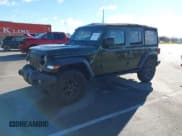 ✅ 2022 Jeep Wrangler Unlimited Sport S • VIN: 1C4HJXDG6NW190732 • Lot: 43789977. Listed on IAAI with 30,870 mi. Free auction sales archive from the USA and detailed vehicle history report at DreamBid. Image 18.