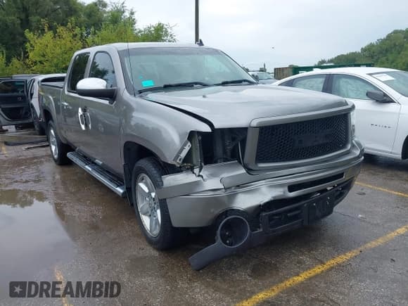 ✅ 2013 GMC Sierra 1500 SLT • VIN: 3GTP2WE72DG194940 • Lot: 43170172. Listed on IAAI with 190,690 mi. Free auction sales archive from the USA and detailed vehicle history report at DreamBid. Image 1.