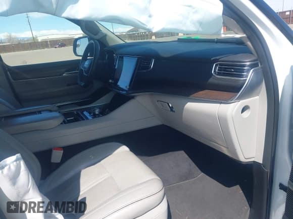 ✅ 2023 Jeep Grand Wagoneer Series II • VIN: 1C4SJSFP4PS556932 • Lot: 41949734. Listed on IAAI with 63,281 mi. Free auction sales archive from the USA and detailed vehicle history report at DreamBid. Image 5.