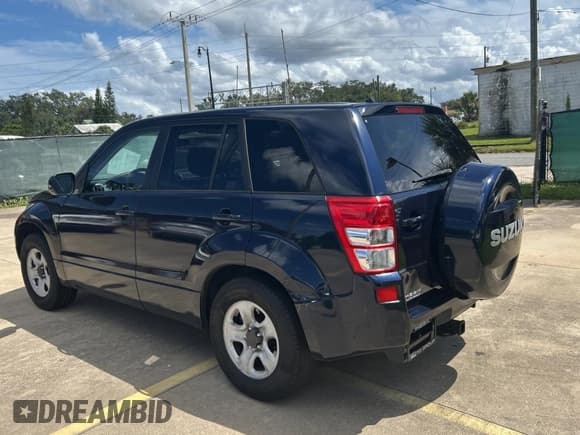 ✅ 2011 Suzuki Grand Vitara Premium • VIN: JS3TE0D23B4100407 • Lot: 71732535. Wystawiony na Copart z przebiegiem 98 575 mil. Bezpłatny archiwum sprzedaży aukcyjnych z USA i szczegółowy raport historii pojazdu na DreamBid. Zdjęcie 3.