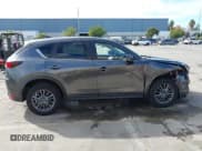 ✅ 2019 Mazda CX-5 Touring • VIN: JM3KFACM6K1501281 • Lot: 43650097. Listed on IAAI with 82,231 mi. Free auction sales archive from the USA and detailed vehicle history report at DreamBid. Image 14.