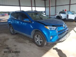 ✅ 2018 Toyota RAV4 XLE • VIN: 2T3WFREV6JW486277 • Lot: 43306006. Listed on IAAI with 83,121 mi. Free auction sales archive from the USA and detailed vehicle history report at DreamBid. Image 1.
