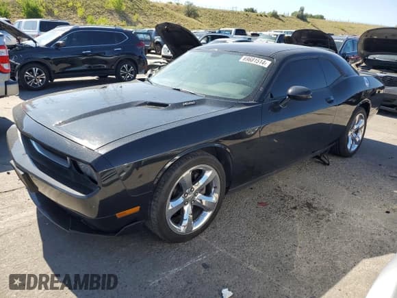 ✅ 2013 Dodge Challenger R/T • VIN: 2C3CDYBTXDH650998 • Lot: 69681514. Wystawiony na Copart z przebiegiem 130 553 mil. Bezpłatny archiwum sprzedaży aukcyjnych z USA i szczegółowy raport historii pojazdu na DreamBid. Zdjęcie 1.