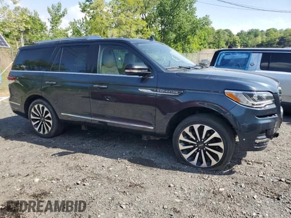✅ 2022 Lincoln Navigator Reserve • VIN: 5LMJJ2LT0NEL01129 • Lot: 57594725. Listed on Copart with 66,843 mi. Free auction sales archive from the USA and detailed vehicle history report at DreamBid. Image 4.