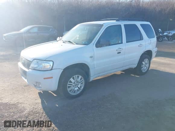 2006 Mercury Mariner Luxury z VIN 4M2YU571X6DJ04235, wystawiony jako IAAI lot #41631062 z przebiegiem 290 925 mil mil oraz . Historia ofert i sprzedaży dostępna na DreamBid. Obrazek 2.