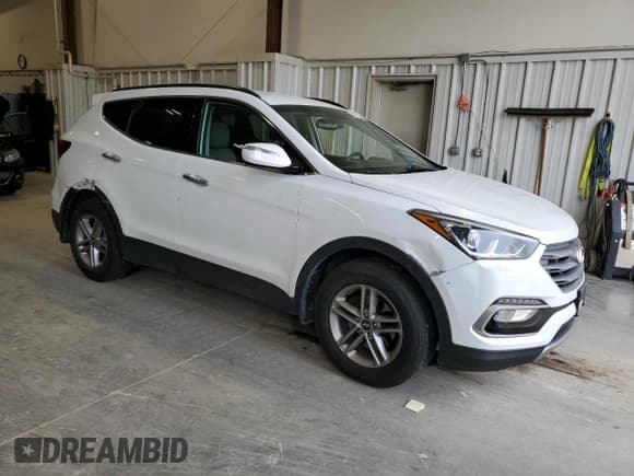 ✅ 2017 Hyundai Santa Fe 2.4L • VIN: 5NMZUDLB8HH051659 • Лот: 91470165. Опубликован ранее на Copart с пробегом 77 956 миль. Бесплатный доступ к архиву аукционных продаж из США и подробный отчёт об истории автомобиля на DreamBid. Изображение 4.