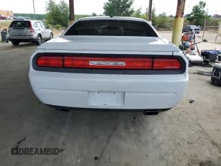 ✅ 2013 Dodge Challenger SXT • VIN: 2C3CDYAG3DH511252 • Lot: 67262874. Wystawiony na Copart z przebiegiem 140 520 mil. Bezpłatny archiwum sprzedaży aukcyjnych z USA i szczegółowy raport historii pojazdu na DreamBid. Zdjęcie 6.