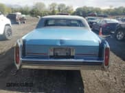 ✅ 1988 Cadillac Brougham • VIN: 1G6DW51Y9J9733455 • Lot: 82313215. Listed on Copart with 78,658 mi. Free auction sales archive from the USA and detailed vehicle history report at DreamBid. Image 6.