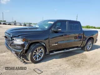 ✅ 2020 Ram 1500 Laramie • VIN: 1C6RREJT6LN100699 • Lot: 67872275. Listed on Copart with 115,513 mi. Free auction sales archive from the USA and detailed vehicle history report at DreamBid. Image 1.